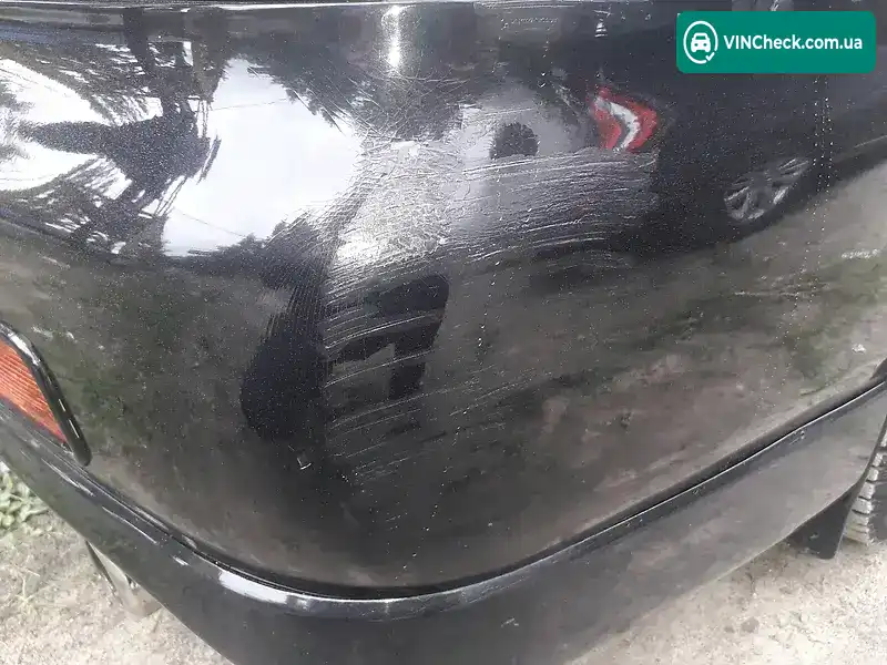 Mitsubishi Lancer 2006, фото з оголошення 1 з 10, VIN JMBSNCS9A6U000656