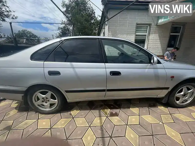 Toyota Carina 1996, фото з оголошення 2 з 9, VIN SB164ABK00E181580