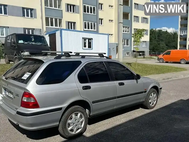 Honda Civic 1999, фото з оголошення 2 з 10, VIN SHHMB8770XU100355