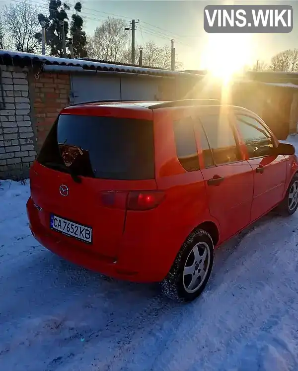Mazda 2 2004, фото з оголошення 2 з 6, VIN JMZNB2WPJN4D72082