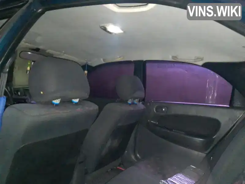 Mazda 323 1997, фото з оголошення 2 з 18, VIN JMZBA125200508269
