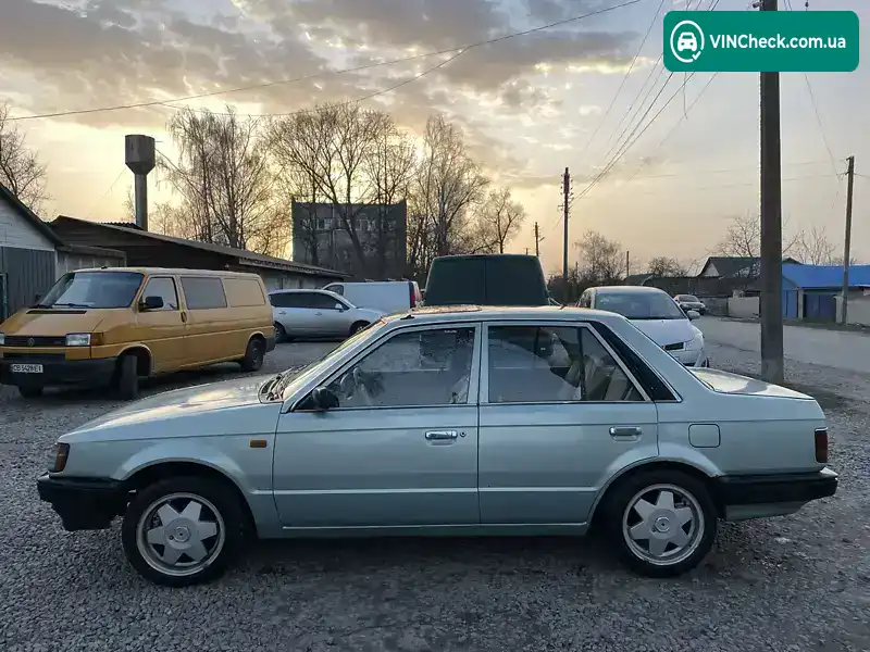 Mazda 323 1986, фото з оголошення 2 з 13, VIN JMZBF124200263077