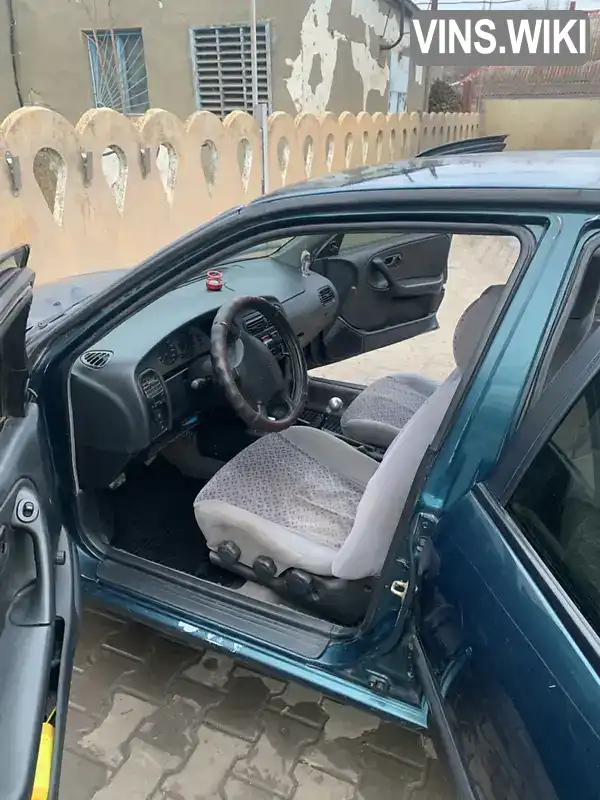 Nissan Primera 1995, фото з оголошення 2 з 10, VIN SJNBCAP10U0591870