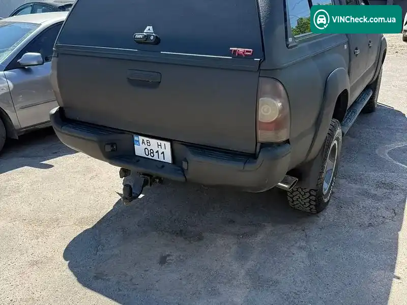 Toyota Tacoma 2014, фото з оголошення 2 з 20, VIN 5TFLU4EN8EX096102