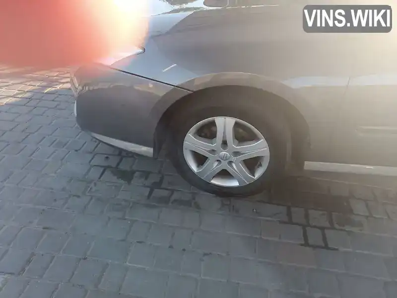 Renault Laguna 2010, фото з оголошення 2 з 21, VIN VF1BT0D0643907848