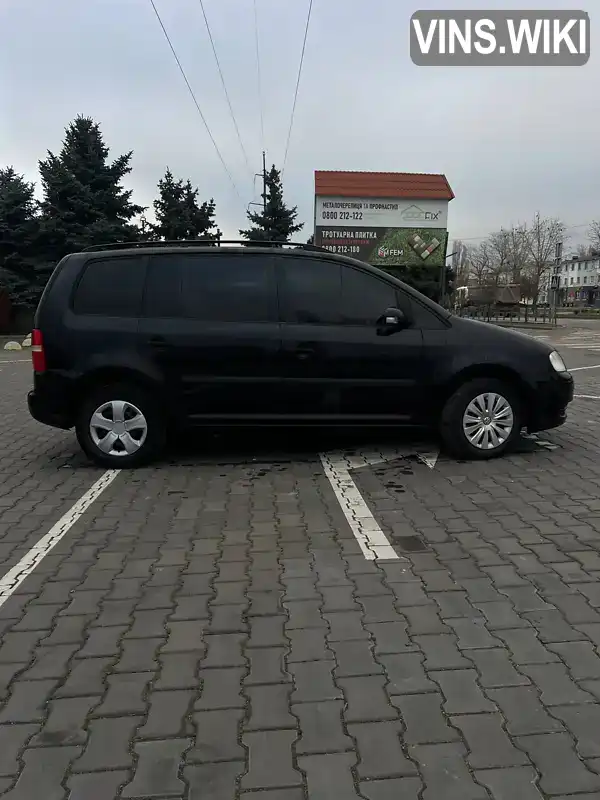 Volkswagen Touran 2004, фото з оголошення 2 з 21, VIN WVGZZZ1TZ4W101071