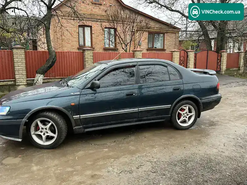 Toyota Carina 1996, фото з оголошення 2 з 14, VIN SB153ABK10E021310