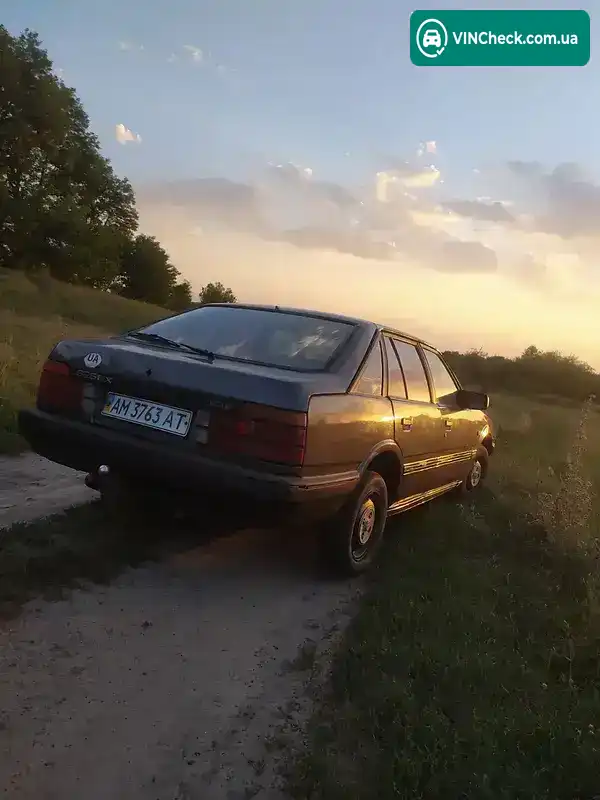Mazda 626 1987, фото з оголошення 1 з 14, VIN JMZGC141101693154