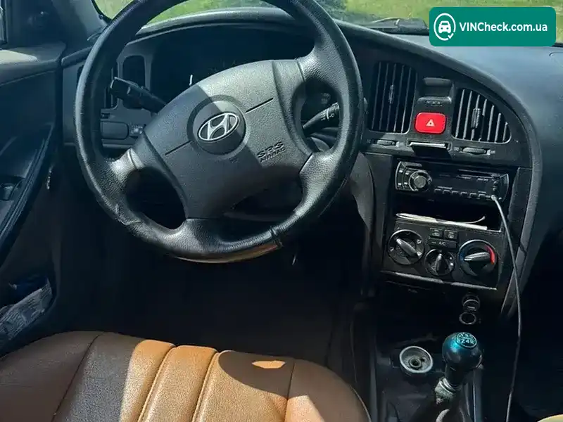 Hyundai Elantra 2004, фото з оголошення 2 з 11, VIN KMHDM41BP4U866347