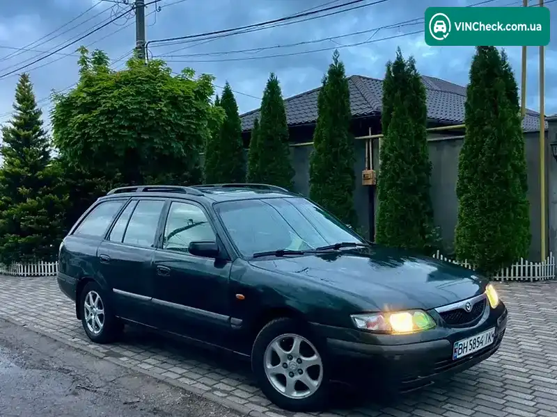Mazda 626 1998, фото з оголошення 1 з 8, VIN JMZGW19S201130066