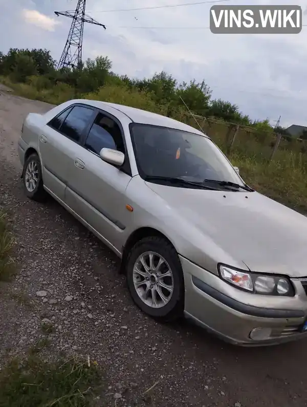 Mazda 626 1999, фото з оголошення 1 з 17, VIN JMZGF12P201242137