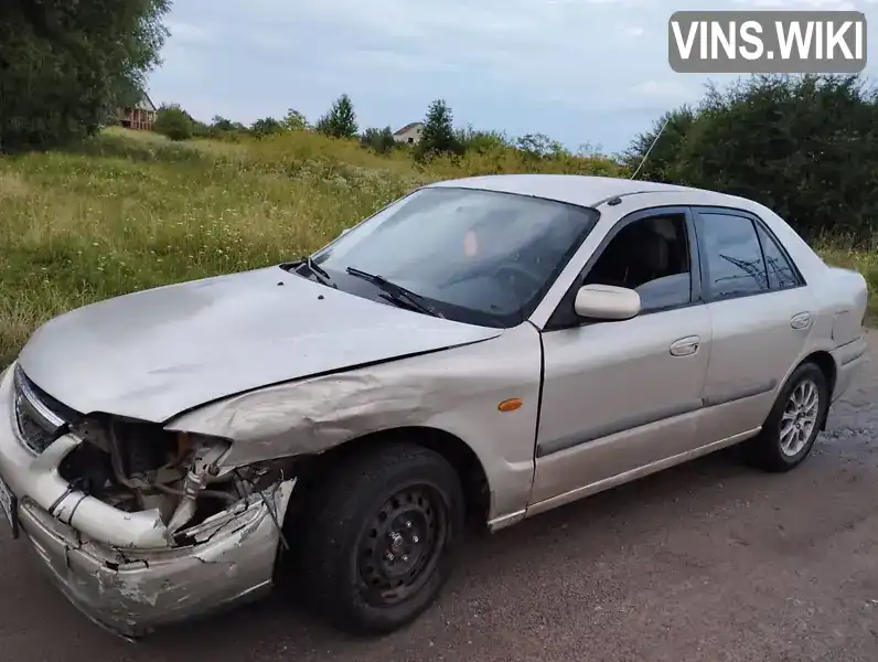 Mazda 626 1999, фото з оголошення 2 з 17, VIN JMZGF12P201242137