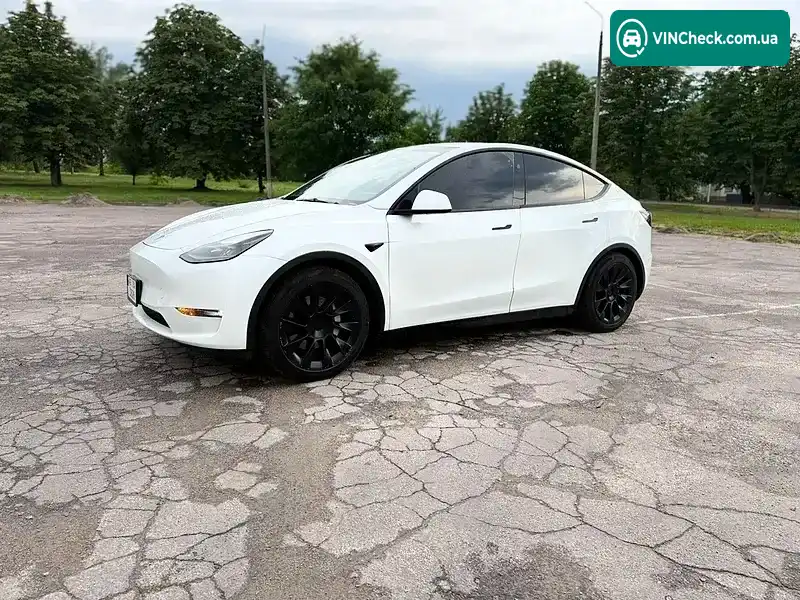 Tesla Model Y 2023, фото з оголошення 2 з 16, VIN 7SAYGAEE0PF806928