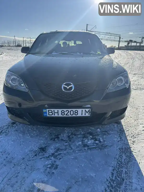 Mazda 3 2004, фото з оголошення 2 з 9, VIN JMZBK14Z251240008