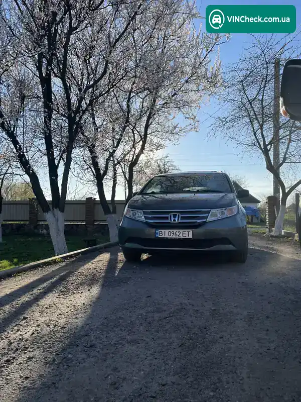 Honda Odyssey 2012, фото з оголошення 2 з 21, VIN 5FNRL5H63CB063135