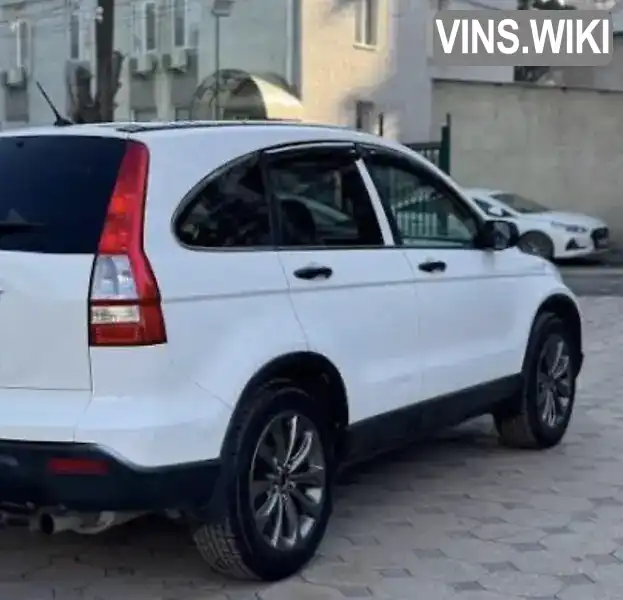 Honda CR-V 2009, фото з оголошення, VIN SHSRE78709U002618