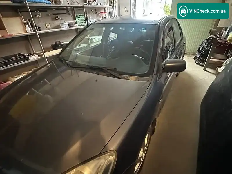 Mitsubishi Lancer 2004, фото з оголошення 2 з 11, VIN JMBSRCS3A5U004154