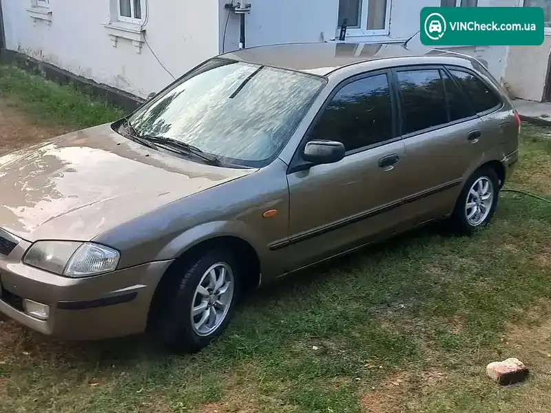 Mazda 323 1999, фото з оголошення 1 з 7, VIN JMZBJ14L201163286