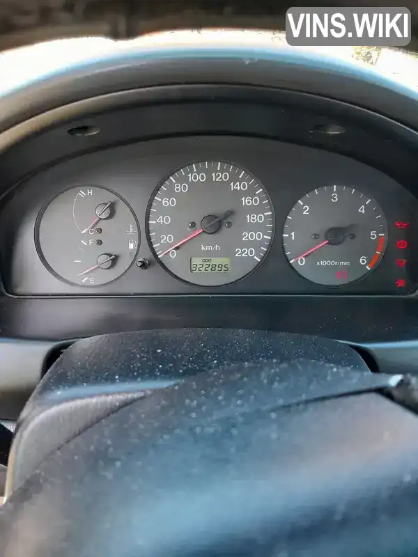 Mazda 323 1999, фото з оголошення 2 з 13, VIN JMZBJ14R201221520