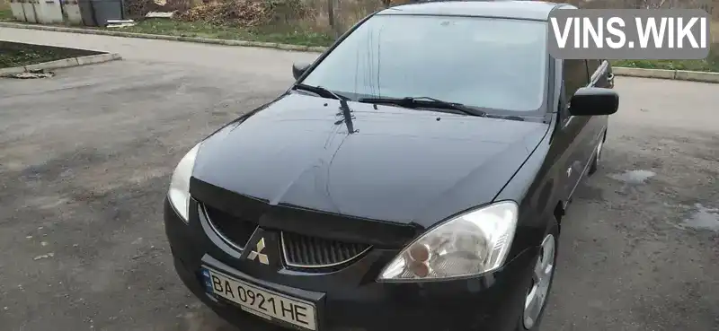 Mitsubishi Lancer 2004, фото з оголошення 2 з 17, VIN JMBSNCS3A5U000862