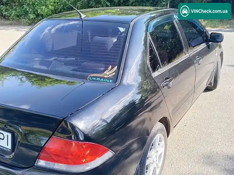 Mitsubishi Lancer 2004, фото з оголошення 1 з 18, VIN JMBSNCS3A4U013049