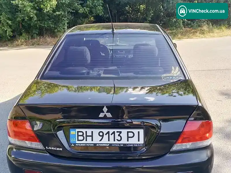 Mitsubishi Lancer 2004, фото з оголошення 2 з 18, VIN JMBSNCS3A4U013049