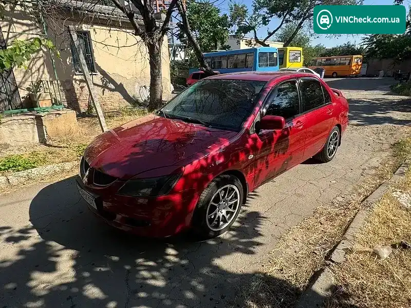 Mitsubishi Lancer 2003, фото з оголошення 2 з 12, VIN JMBSNCS3A4U004875