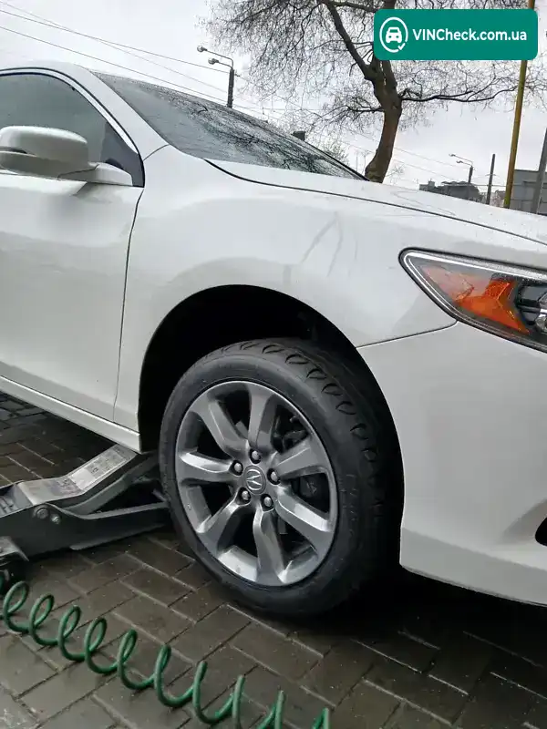 Acura Rlx 2013, фото з оголошення 2 з 21, VIN JH4KC1F33EC001333