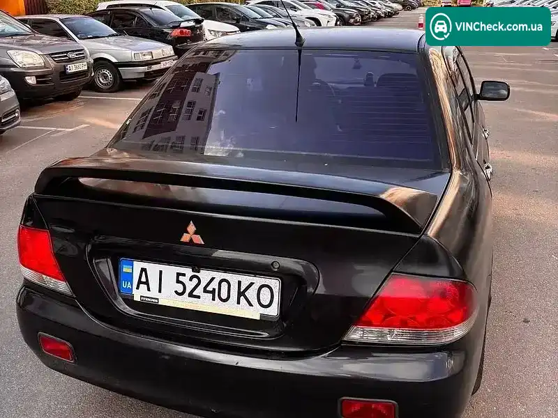 Mitsubishi Lancer 2004, фото з оголошення 1 з 18, VIN JMBSRCS3A4U003660