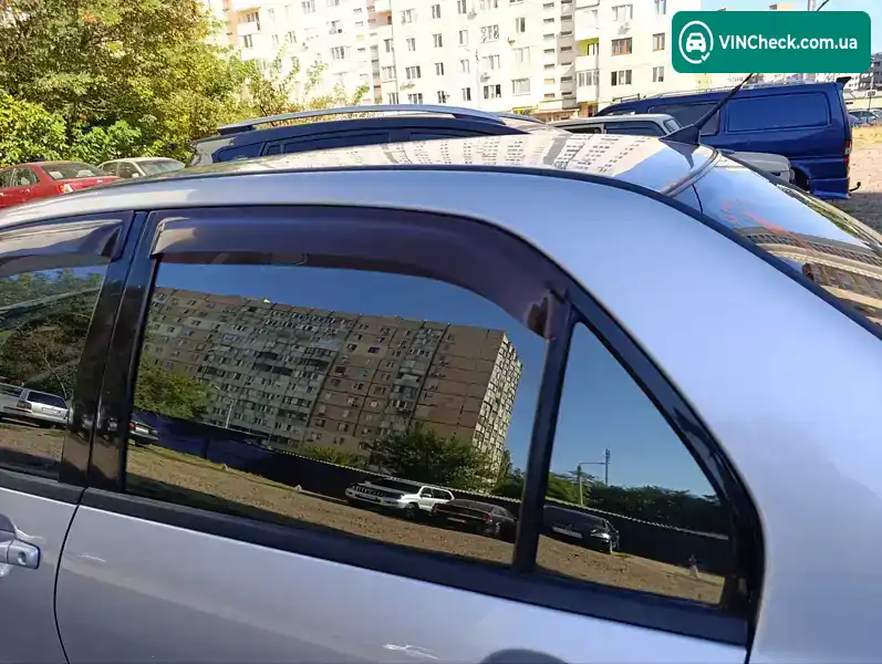 Mitsubishi Lancer 2004, фото з оголошення 2 з 18, VIN JMBSNCS3A4U005435