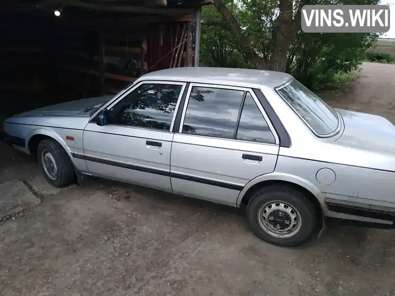 Mazda 626 1986, фото з оголошення 1 з 3, VIN JMZGC121201666440