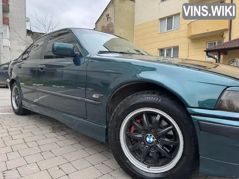 BMW 3 Series 1994, фото з оголошення 2 з 10, VIN WBAAE510701246813