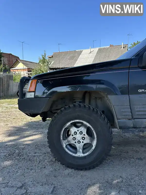 Jeep Grand Cherokee 1997, фото з оголошення 1 з 21, VIN 1J4GZ58S0TC313294