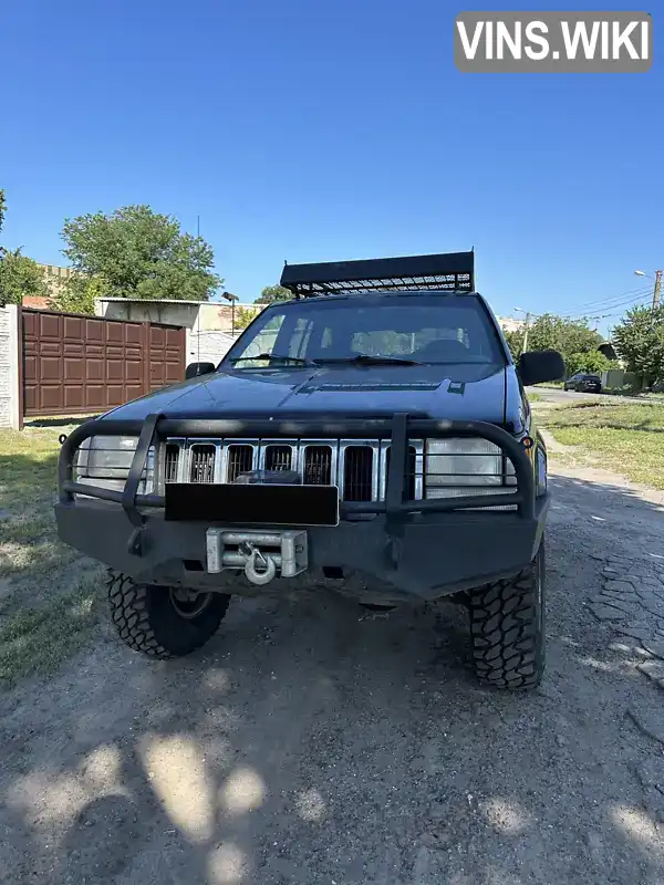 Jeep Grand Cherokee 1997, фото з оголошення 2 з 21, VIN 1J4GZ58S0TC313294