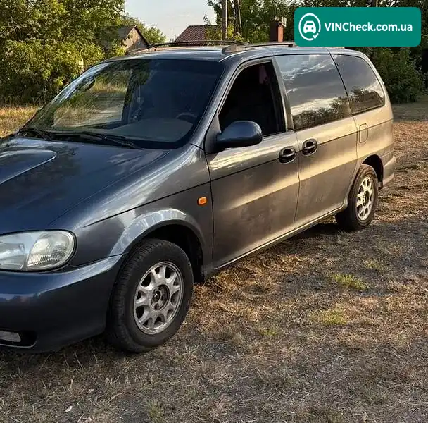 Kia Carnival 1999, фото з оголошення 2 з 20, VIN KNEUP7512Y6114660