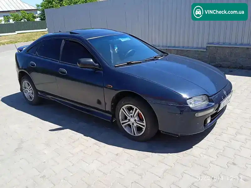 Mazda 323 1998, фото з оголошення 1 з 17, VIN JMZBA145201663354