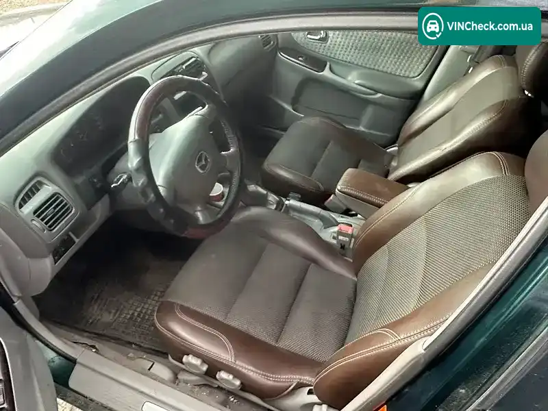 Mazda 626 2002, фото з оголошення 2 з 4, VIN JMZGF16S201469519