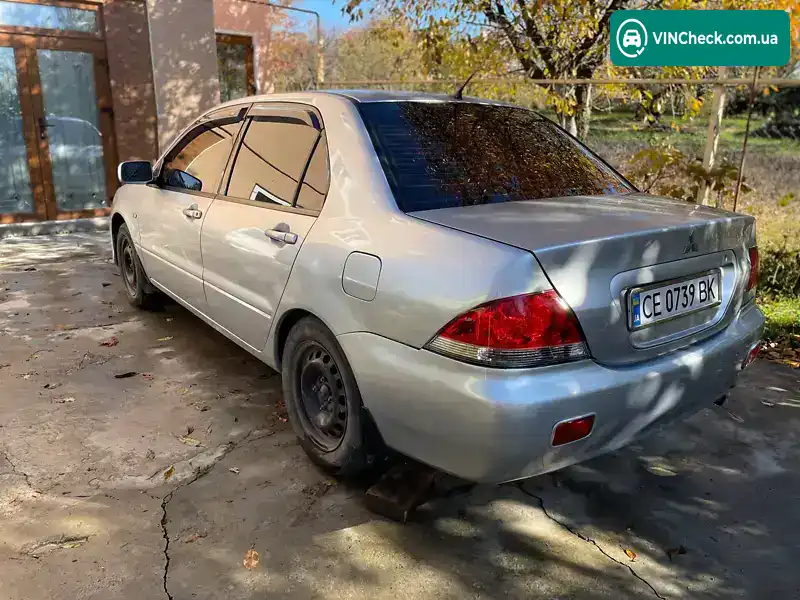 Mitsubishi Lancer 2003, фото з оголошення 1 з 12, VIN JMBSNCS3A4U004319