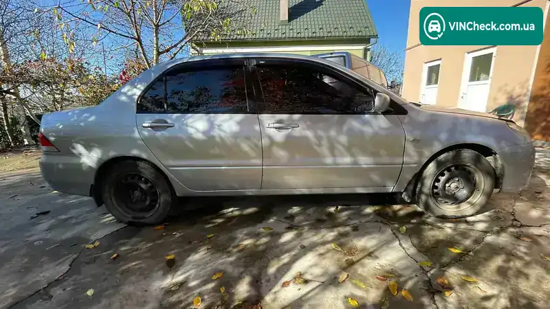 Mitsubishi Lancer 2003, фото з оголошення 2 з 12, VIN JMBSNCS3A4U004319