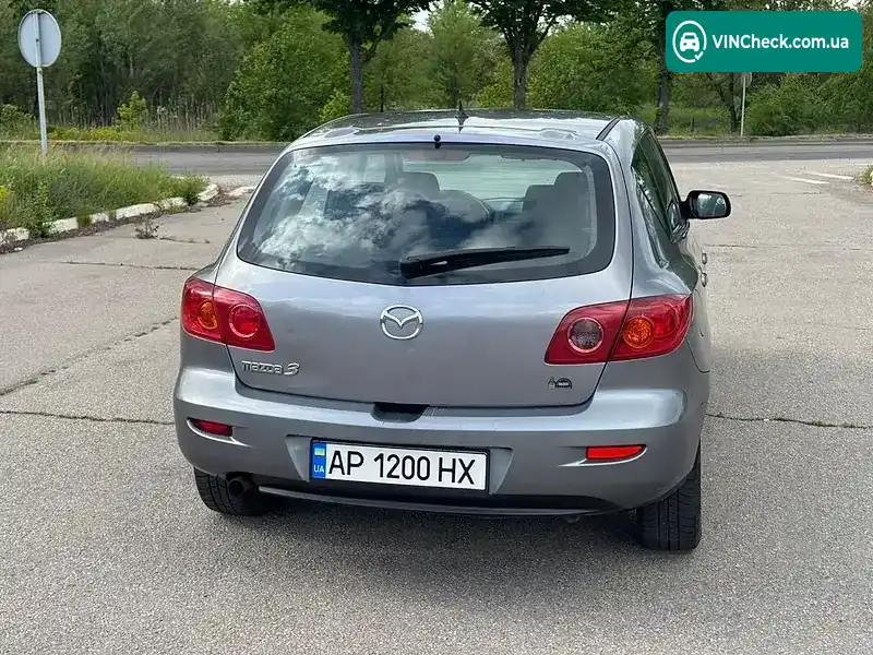 Mazda 3 2004, фото з оголошення 2 з 11, VIN JMZBK14Z251240486