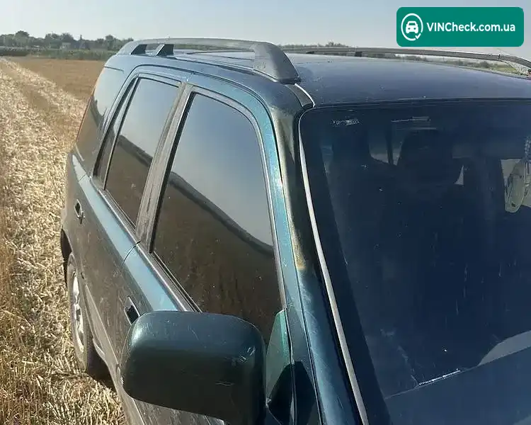 Honda CR-V 1998, фото з оголошення 2 з 8, VIN JHLRD1750WC259661