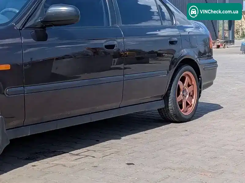 Honda Civic 1996, фото з оголошення 2 з 17, VIN JHMEJ95400S017878