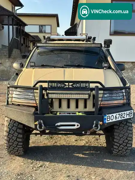 Jeep Grand Cherokee 1999, фото з оголошення 2 з 21, VIN 1J4GW58S2XC735730