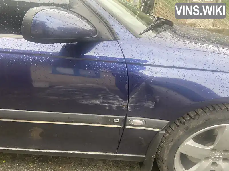 Opel Omega 1999, фото з оголошення 2 з 10, VIN W0L0VBM69X1002610