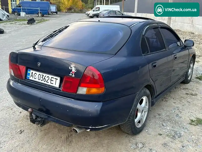 Mitsubishi Carisma 1995, фото з оголошення 2 з 8, VIN XMCLNDA2ATF001205