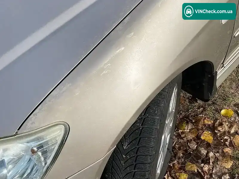 Honda Civic 2004, фото з оголошення 1 з 9, VIN NLAES76704W320077