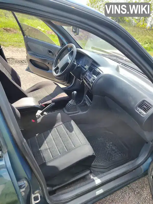 Toyota Corolla 1993, фото з оголошення 2 з 17, VIN JT164CEA007003236