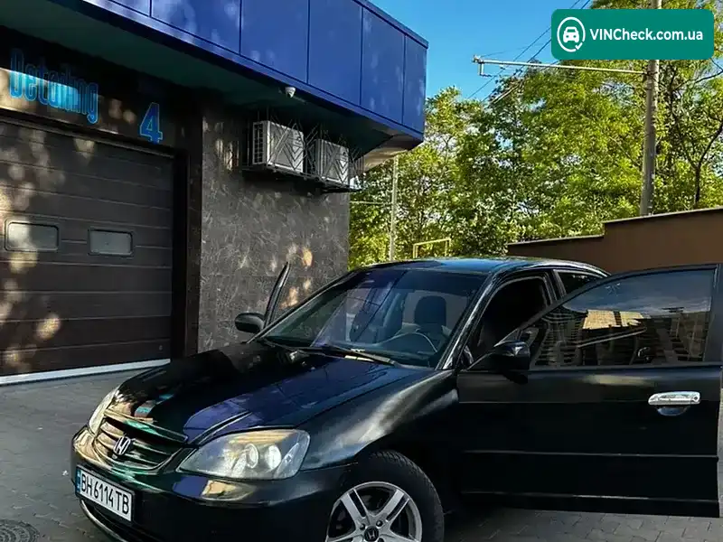 Honda Civic 2001, фото з оголошення 1 з 12, VIN 1HGES16311L038149