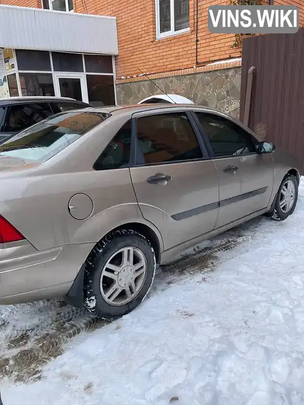 Ford Focus 2003, фото з оголошення 2 з 8, VIN 1FAFP33P83W217903