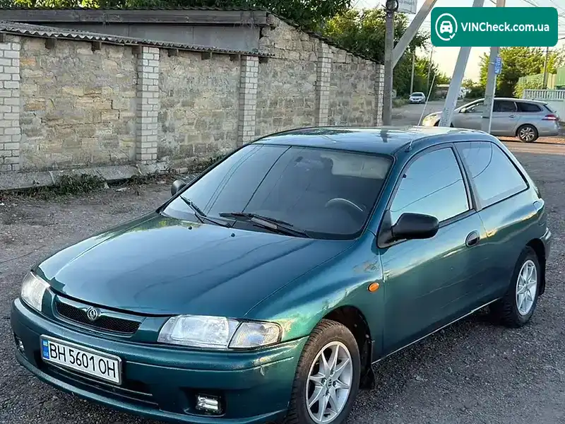 Mazda 323 1997, фото з оголошення 1 з 7, VIN JMZBA153200595037